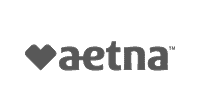 Aetna logo with a heart shape to the left of the word "aetna" on a dark background, representing trusted care like Grow With Me Pediatrics.